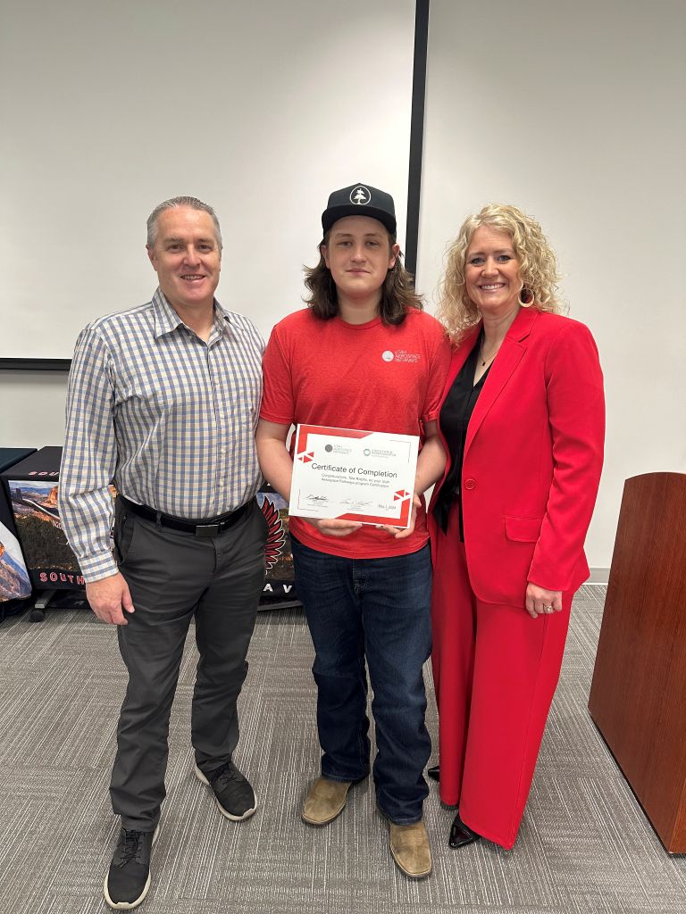 Megen with her son Tate at his Utah Aerospace Pathways certificate presentation