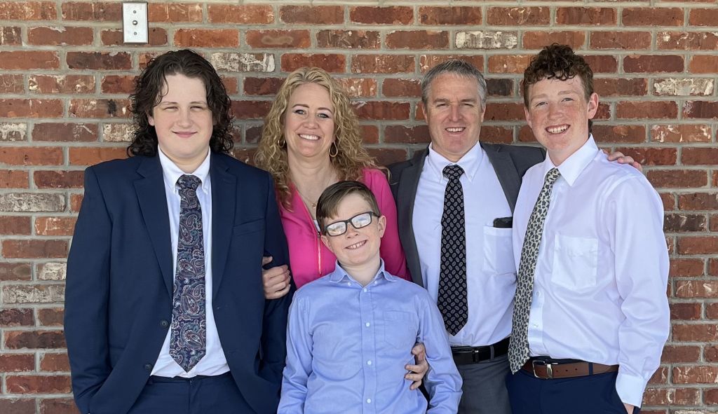 Megen Ralphs with her husband Chris and their three sons